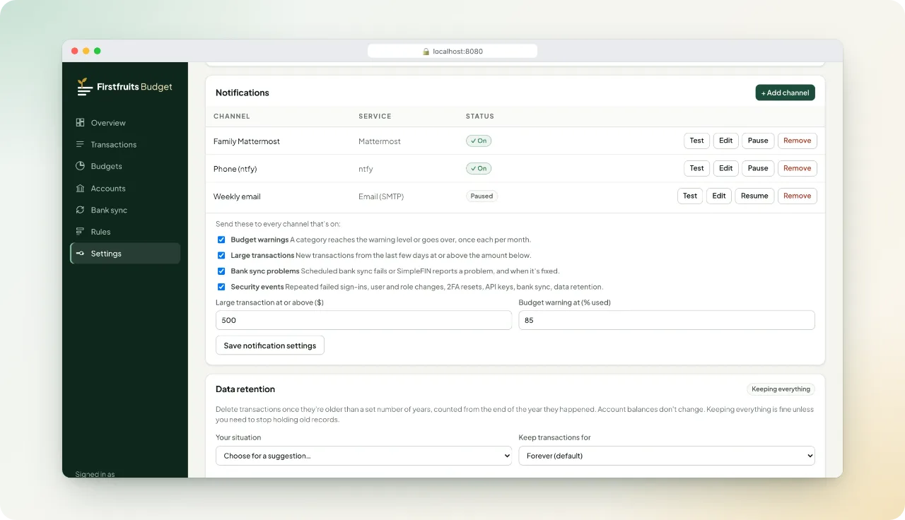 Notification settings with Mattermost, ntfy and email channels, each with Test, Edit and Pause buttons, checkboxes for budget, large transaction, bank sync and security alerts, and data retention settings below.